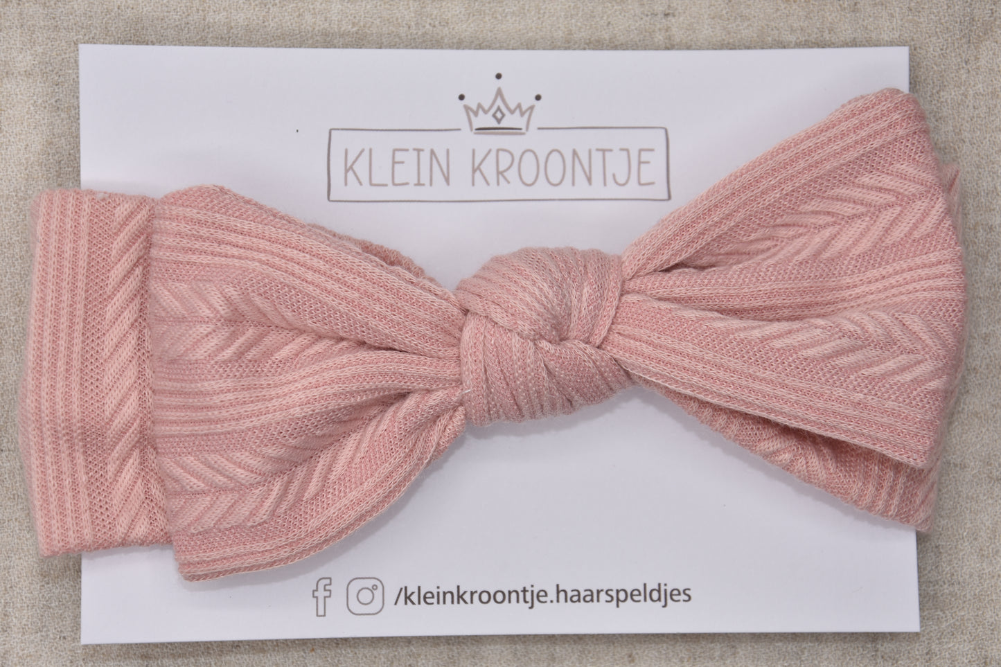 Haarband met strik motief - roze